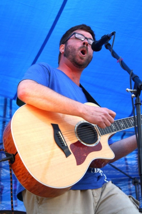 Guy with acoustic guitar 2012