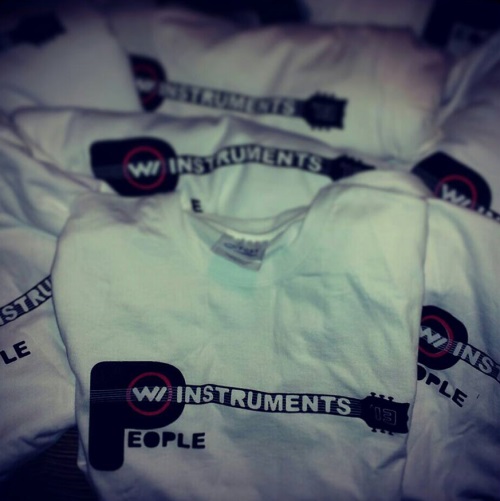 PWI T shirt pile